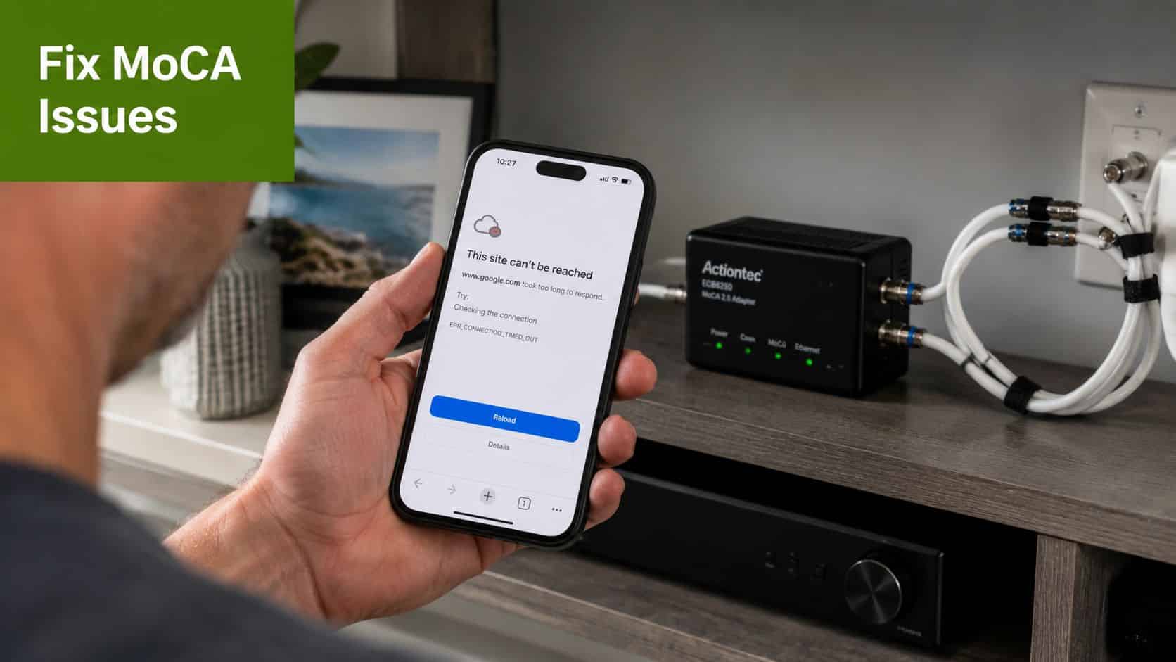 A person holding a smartphone showing a connection error while next to an Actiontec MoCA network adapter.