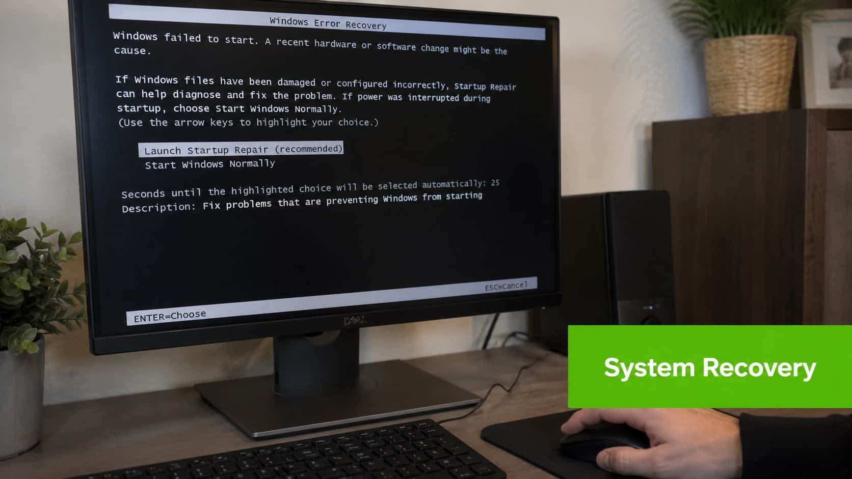 A computer screen displaying a Windows Error Recovery message with options to launch startup repair.