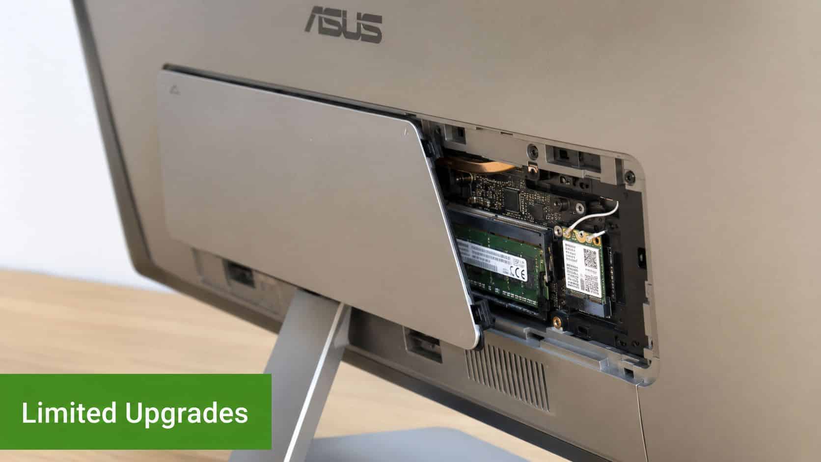 Rear view of an Asus all-in-one PC with its service panel opened to show internal components.